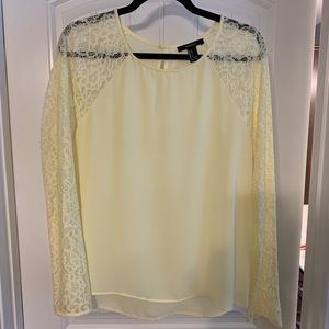 Light yellow lace and sheer blouse